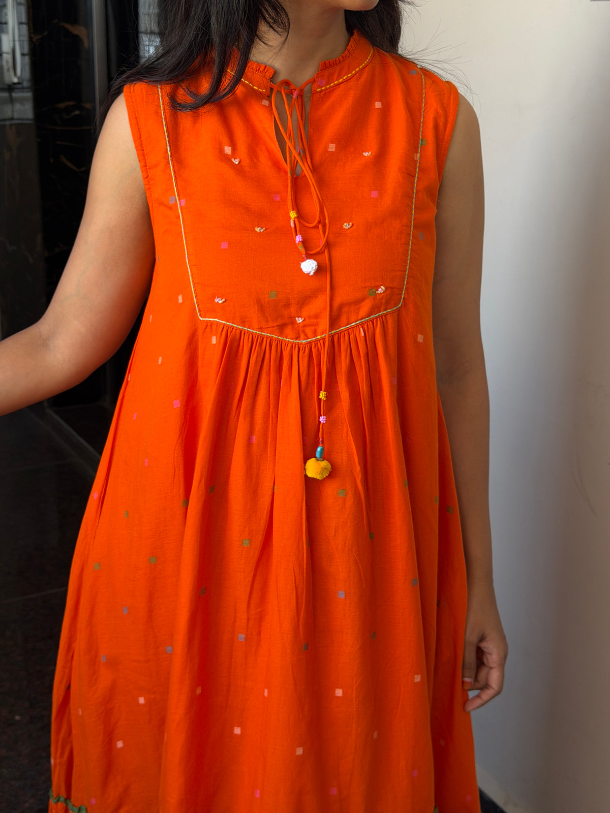 A0827 Jamdani orange dress with hand kanta work
