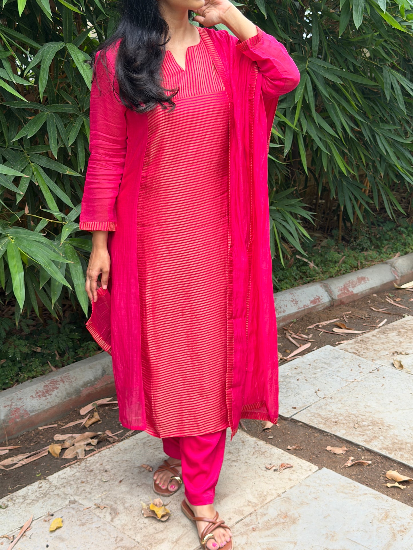 A0772 Rani pink Mul Chanderi 3 piece suit with golden stripes Mul Chanderi fabric detailing all over the dress & comes with border all over the dress