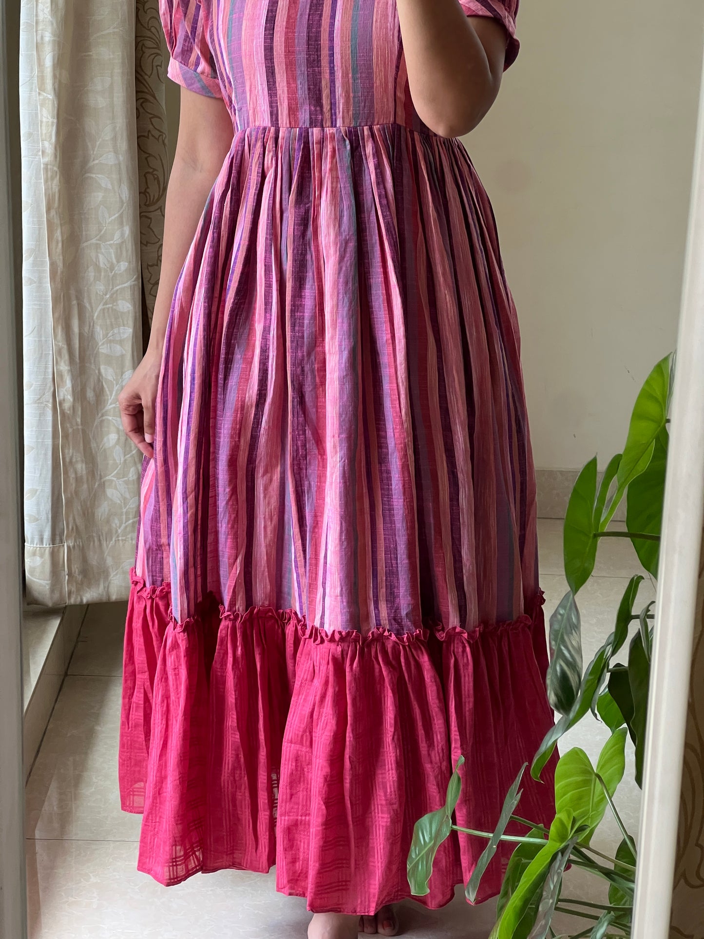 A0525 pink handloom cotton one piece dress in stripes and gathering at bottom of the dress