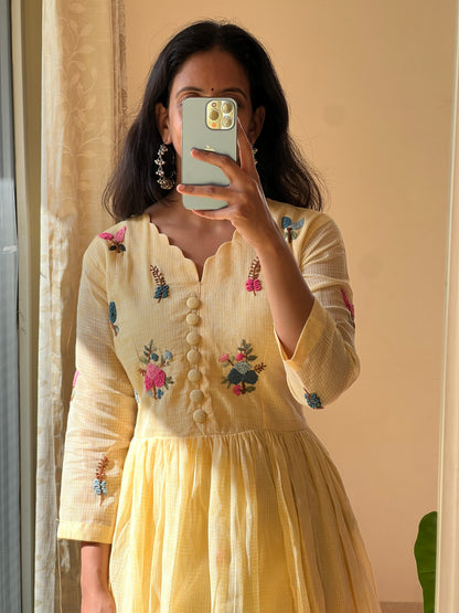A0463 yellow Kota one piece dress with hand embroidery detailing all over the dress