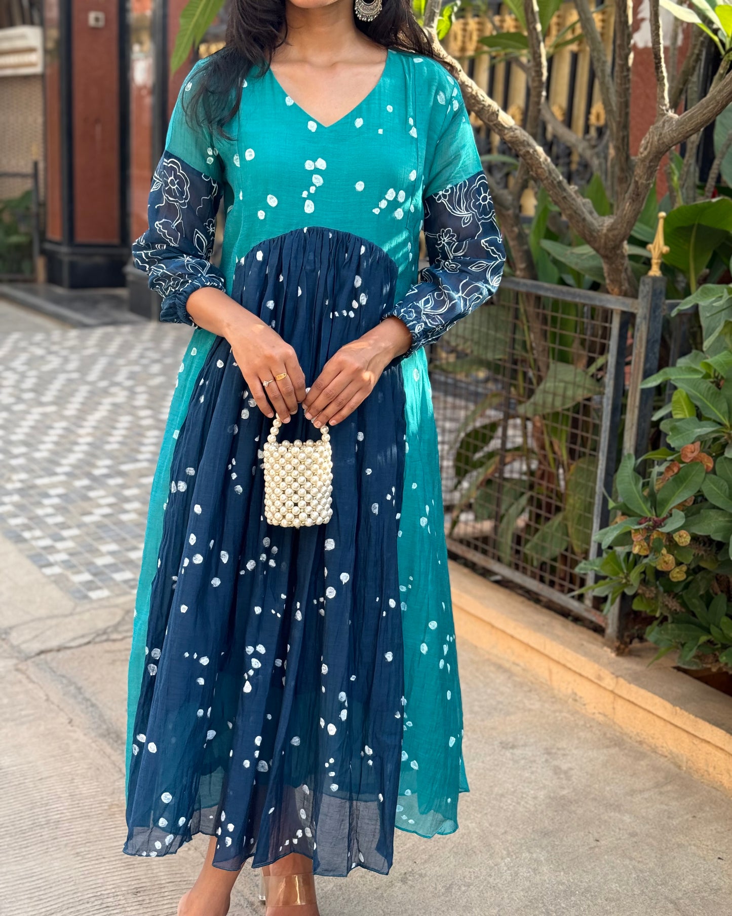 A0444 This stunning block-printed dress is crafted from a luxurious blend of premium MulChanderi fabric. Experience the ultimate in eco-friendly fashion and artistic detail of Block print.