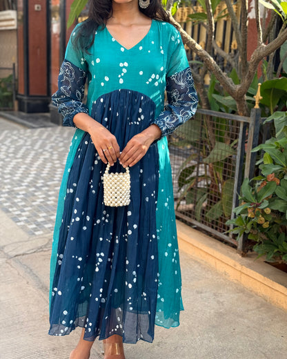 A0444 This stunning block-printed dress is crafted from a luxurious blend of premium MulChanderi fabric. Experience the ultimate in eco-friendly fashion and artistic detail of Block print.