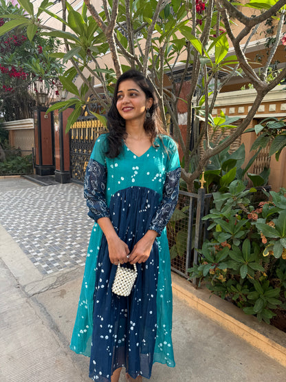 A0444 This stunning block-printed dress is crafted from a luxurious blend of premium MulChanderi fabric. Experience the ultimate in eco-friendly fashion and artistic detail of Block print.