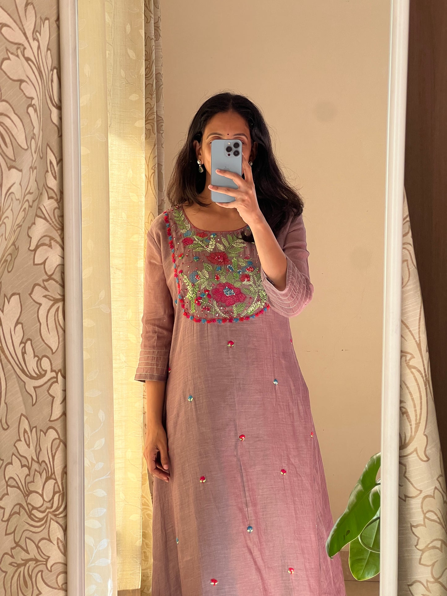A0546 brown mul chanderi 2 piece dress with Kantha work detailing on yoke part & butties all over the dress