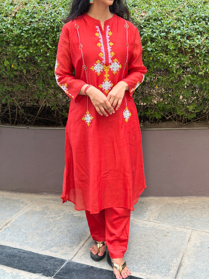 A0673 rust mul Chanderi 2 piece set with Kutch work hand embroidery detailing all over the top