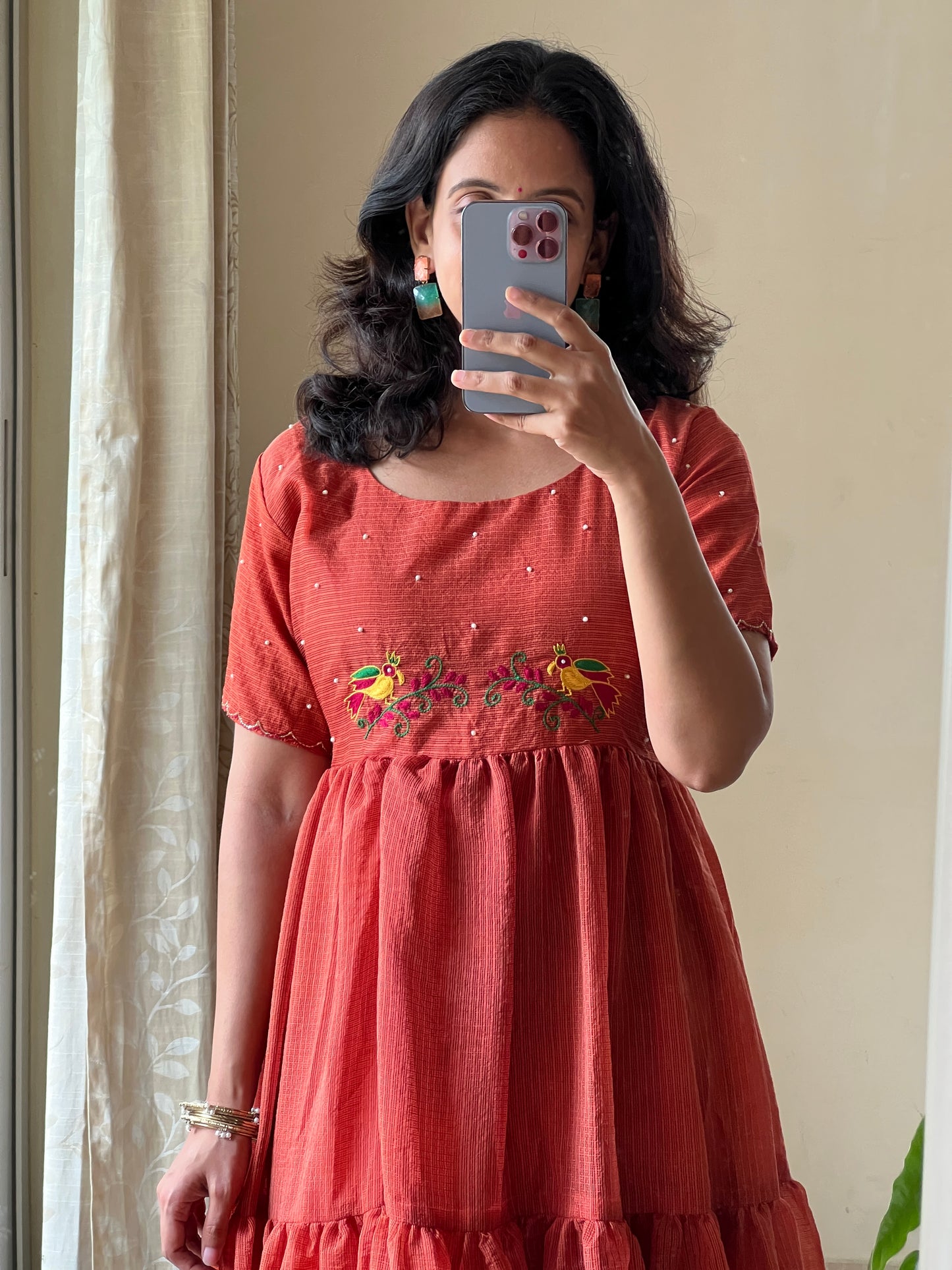 A0463 rust kota frock with birds hand embroidery detailing