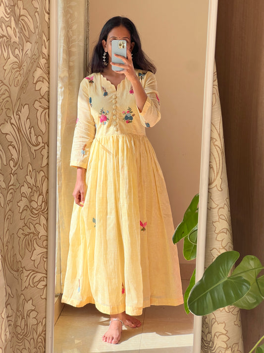 A0463 yellow Kota one piece dress with hand embroidery detailing all over the dress