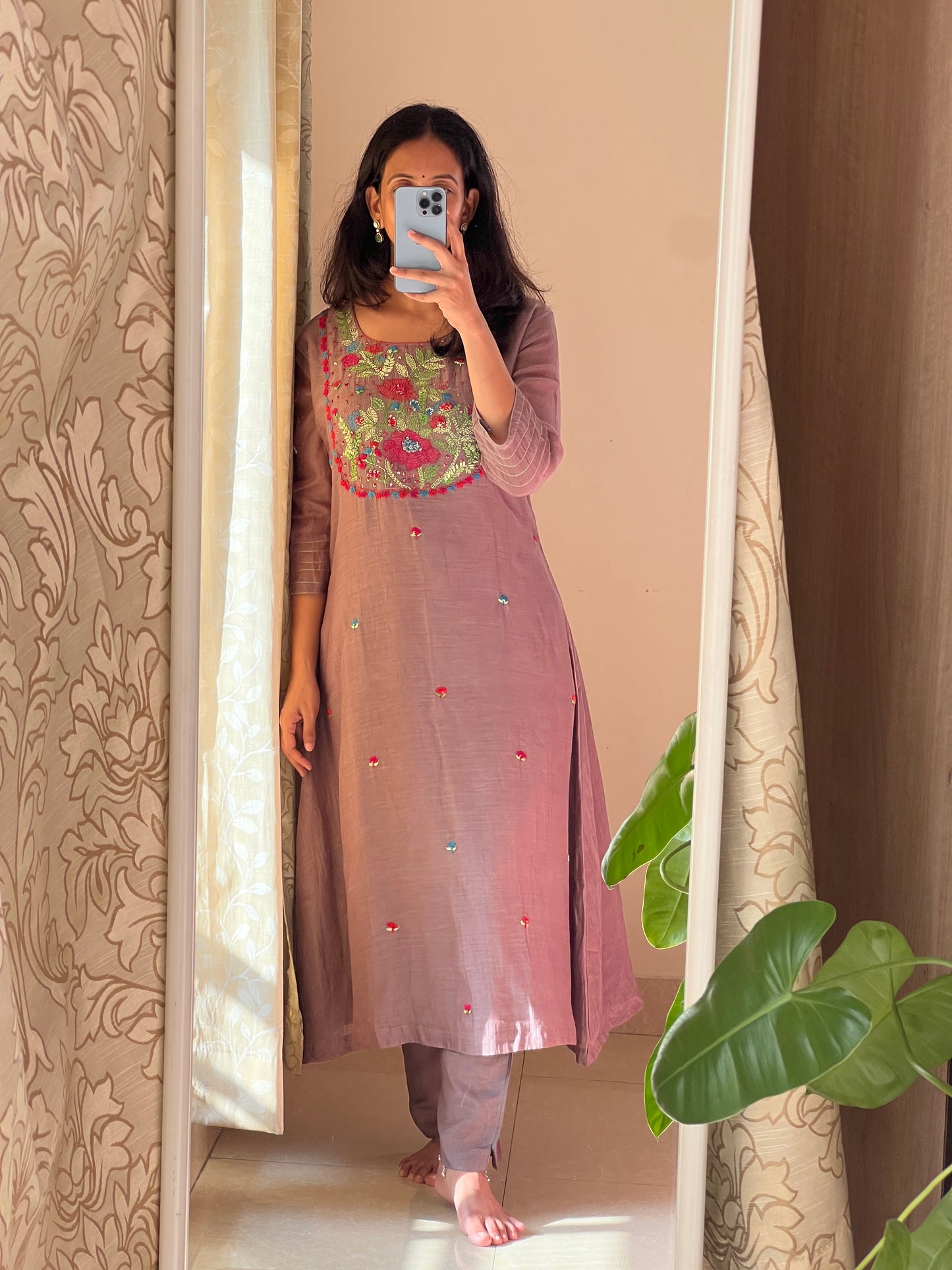 A0546 brown mul chanderi 2 piece dress with Kantha work detailing on yoke part & butties all over the dress