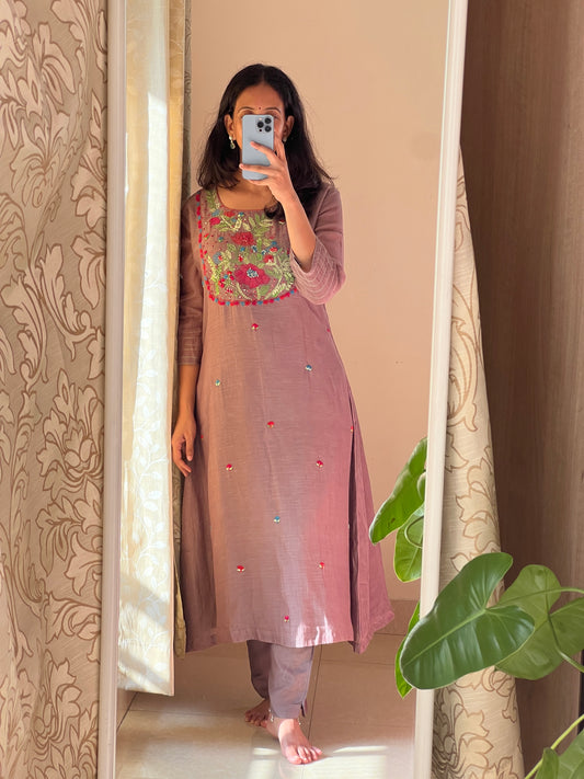 A0546 brown mul chanderi 2 piece dress with Kantha work detailing on yoke part & butties all over the dress