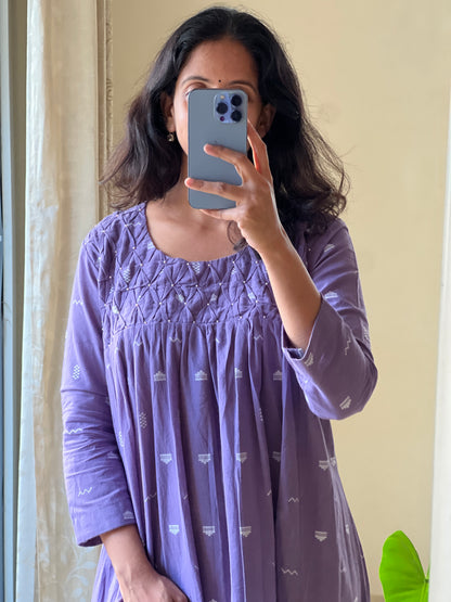 A0544 lavender handloom cotton one piece dress with smocking detailing on yoke part