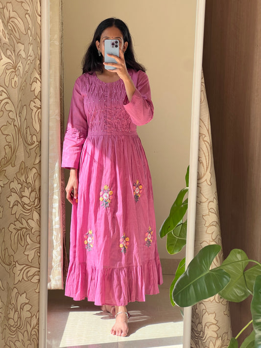 A0547 pink Mulmul one piece dress with rose bunches hand embroidery all over the dress & smocking detailing over yoke part