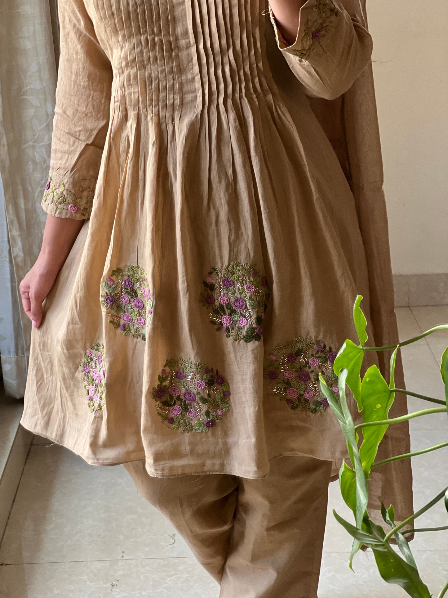 A0409 Trending Chikku colour Mulmul 3 piece set with hand embroidery and pleats detailing