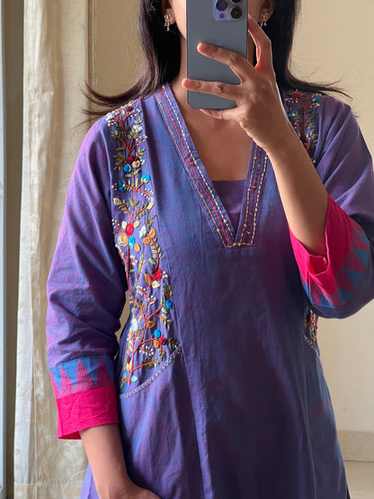 A0591 blue handloom cotton one piece dress with hand embroidery detailing over the pockets & v neck with Kantha work detailing