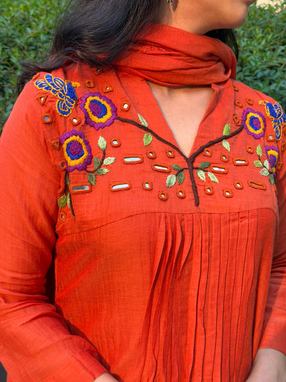 A0659 orange mul chanderi 3 piece dress with hand, mirror embroidery on yoke part, these are one sizes down so go for one size up