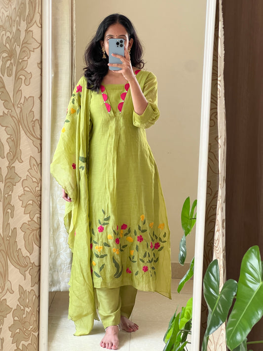 A0522 green Mulchanderi 3 piece dress with multi colour applique work detailing at the bottom of the dress
