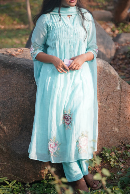 A0587 sea blue mul chanderi 3 piece dress with floral hand embroidery detailing & pleats detailing on yoke part