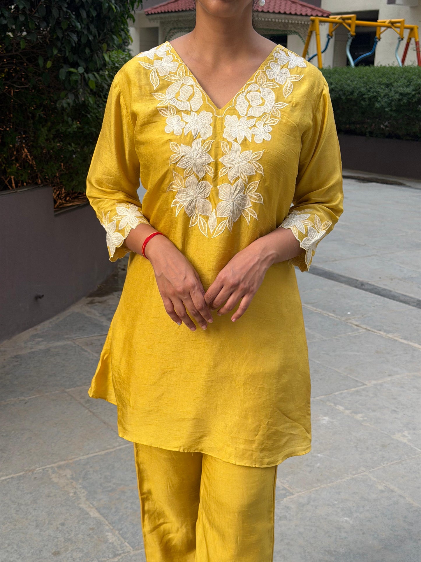 A0663 yellow Dola silk coord set whith applique work detailing. These are one sizes down so mentioned tag size vs actual size 38-36,38-40,40-42,42-44,44-46