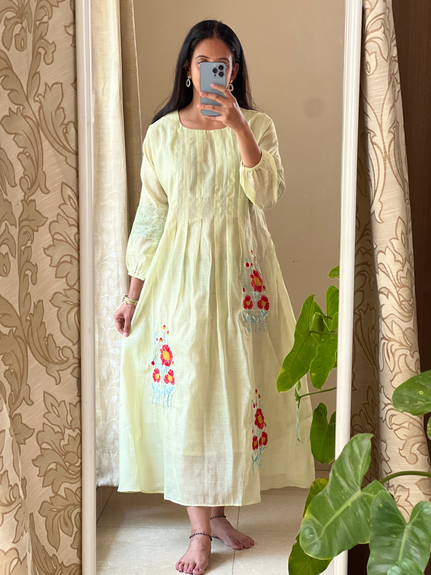 A0382 Mul chanderi frock in pretty pista green shade, provided with embroidery and lace detailing for hands