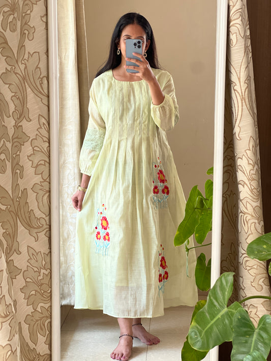 A0382 Mul chanderi frock in pretty pista green shade, provided with embroidery and lace detailing for hands