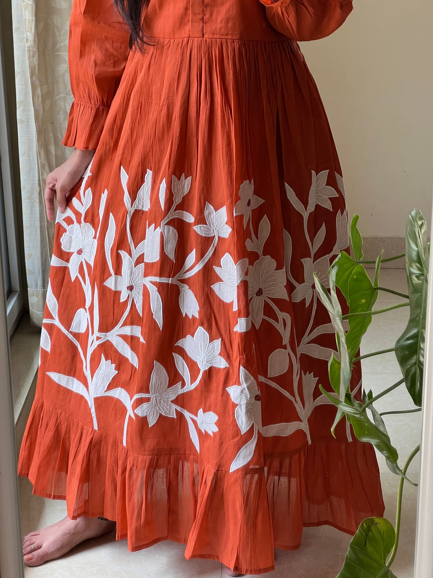 A0419 Mulmul Rust shade frock with applique work and pleats detailing, comes with complete cotton lining