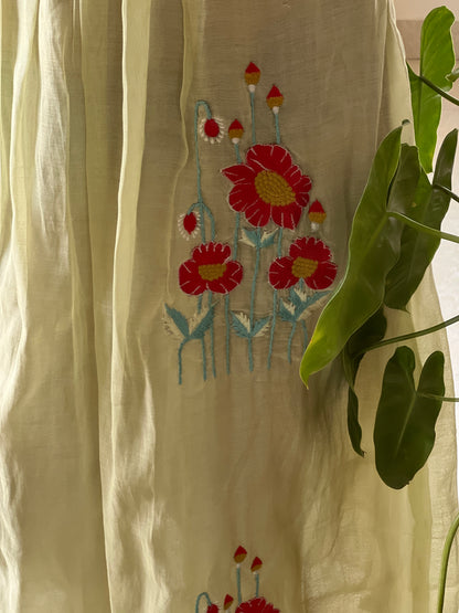 A0382 Mul chanderi frock in pretty pista green shade, provided with embroidery and lace detailing for hands