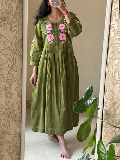 A0644 green Mulmul one piece dress with applique work detailing on yoke part
