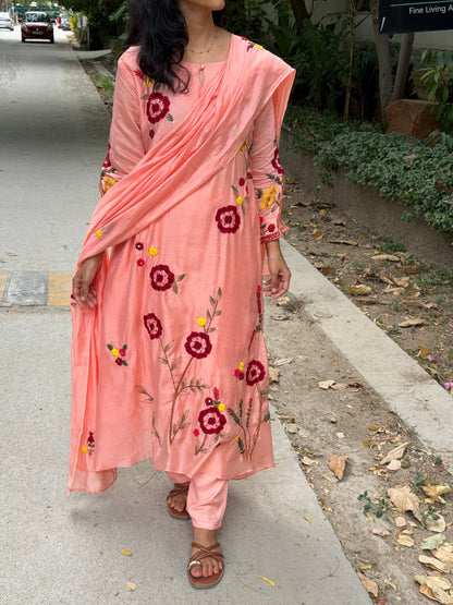 A0766 peach Mul chanderi 3 piece dress with hand paint , applique work & hand embroidery detailing all over the dress