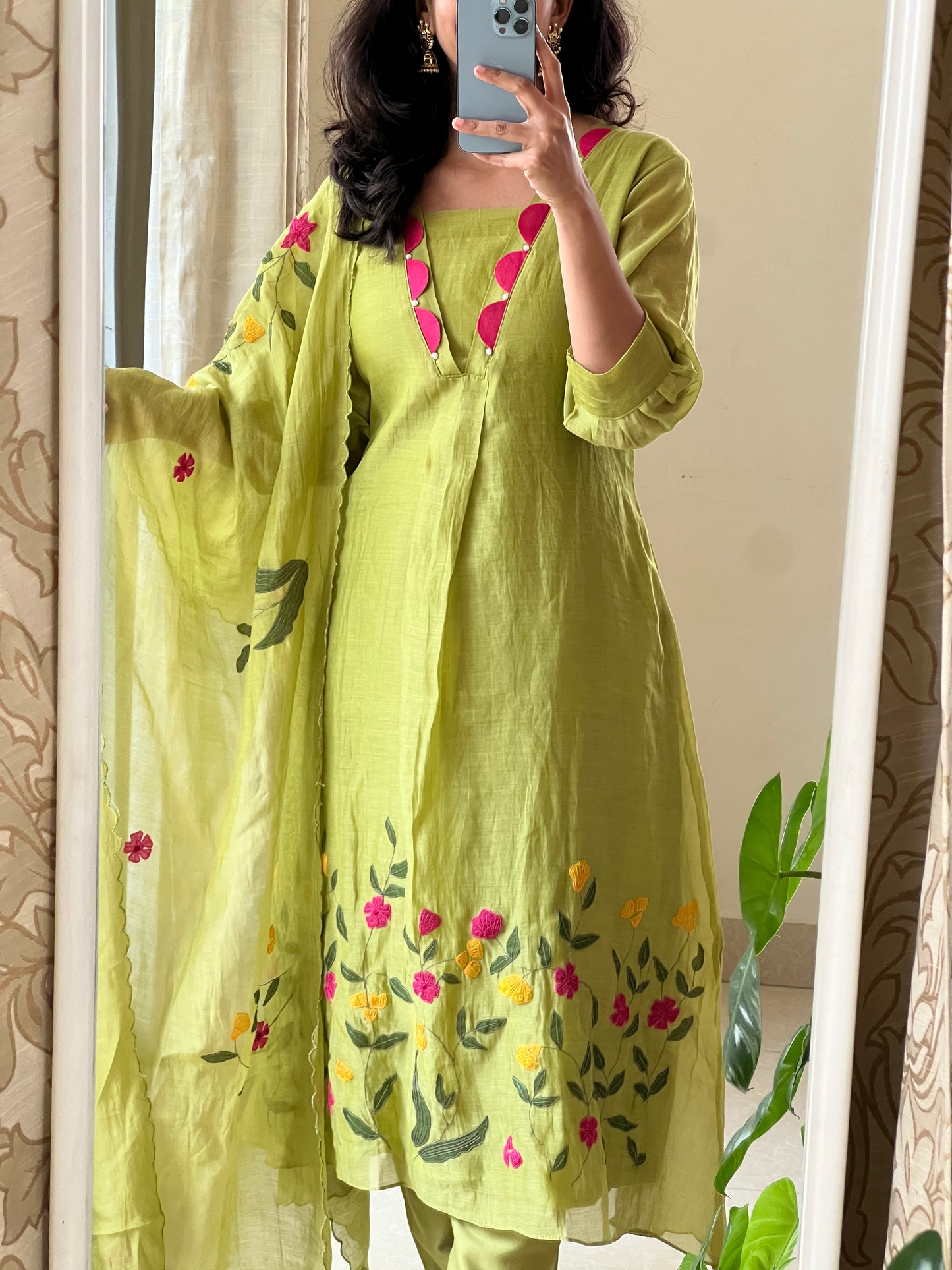 A0522 green Mulchanderi 3 piece dress with multi colour applique work detailing at the bottom of the dress
