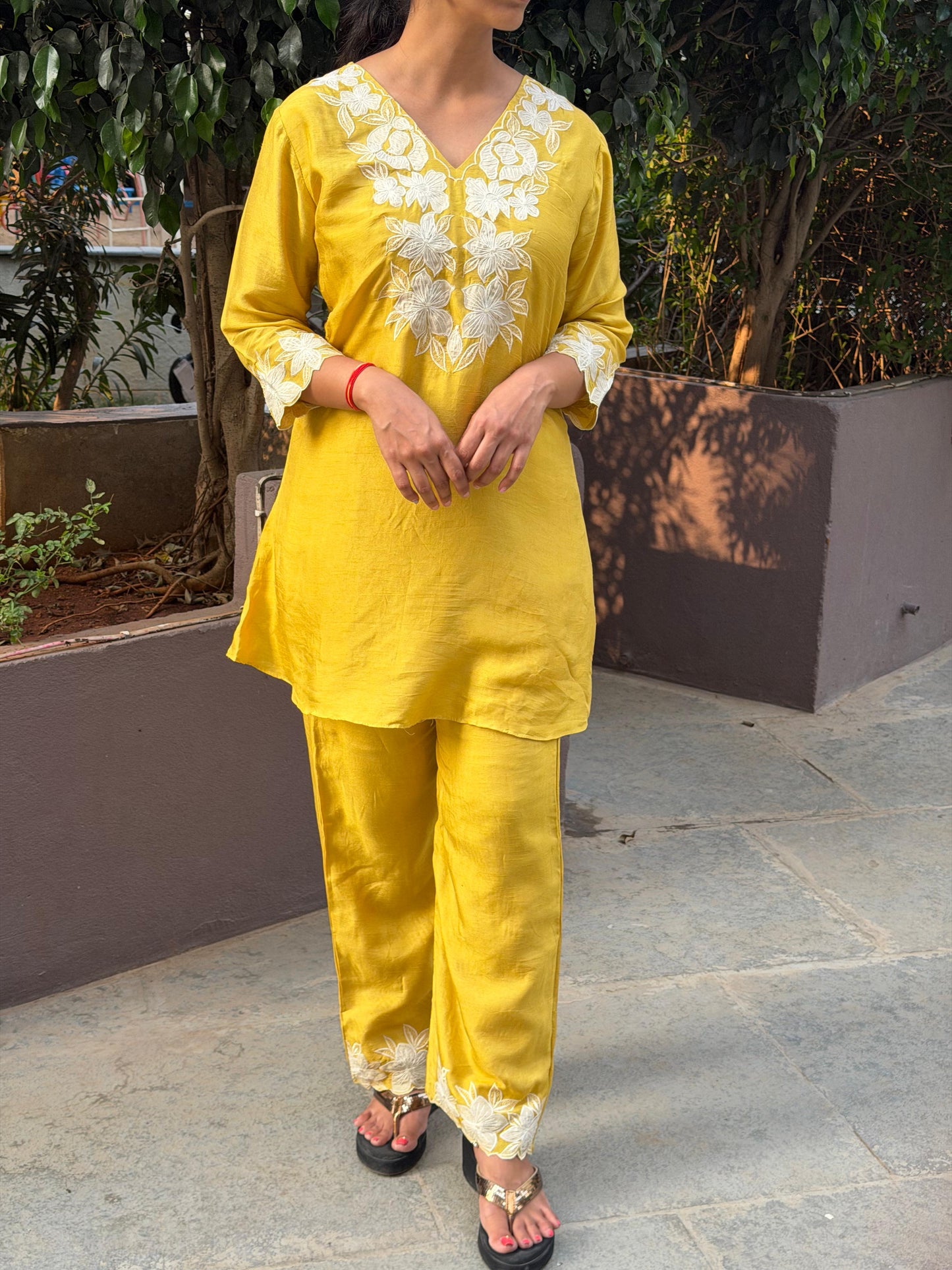 A0663 yellow Dola silk coord set whith applique work detailing. These are one sizes down so mentioned tag size vs actual size 38-36,38-40,40-42,42-44,44-46