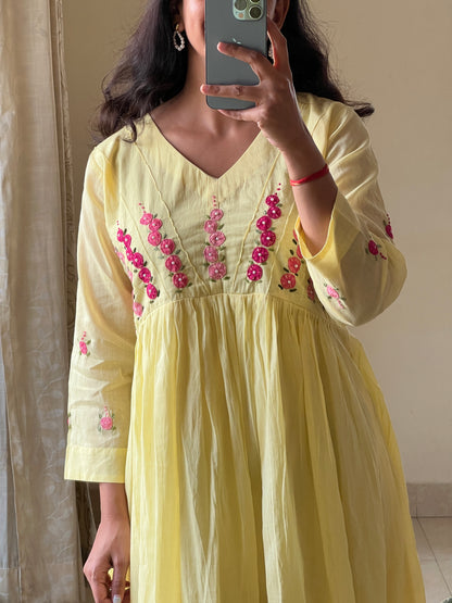 A0646 yellow Mulmul cotton one piece dress with hand embroidery detailing on yoke part