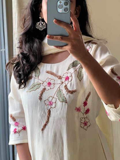 A0597 white mul chanderi 3 piece dress with hand embroidery detailing on yoke & butties on all over dupatta