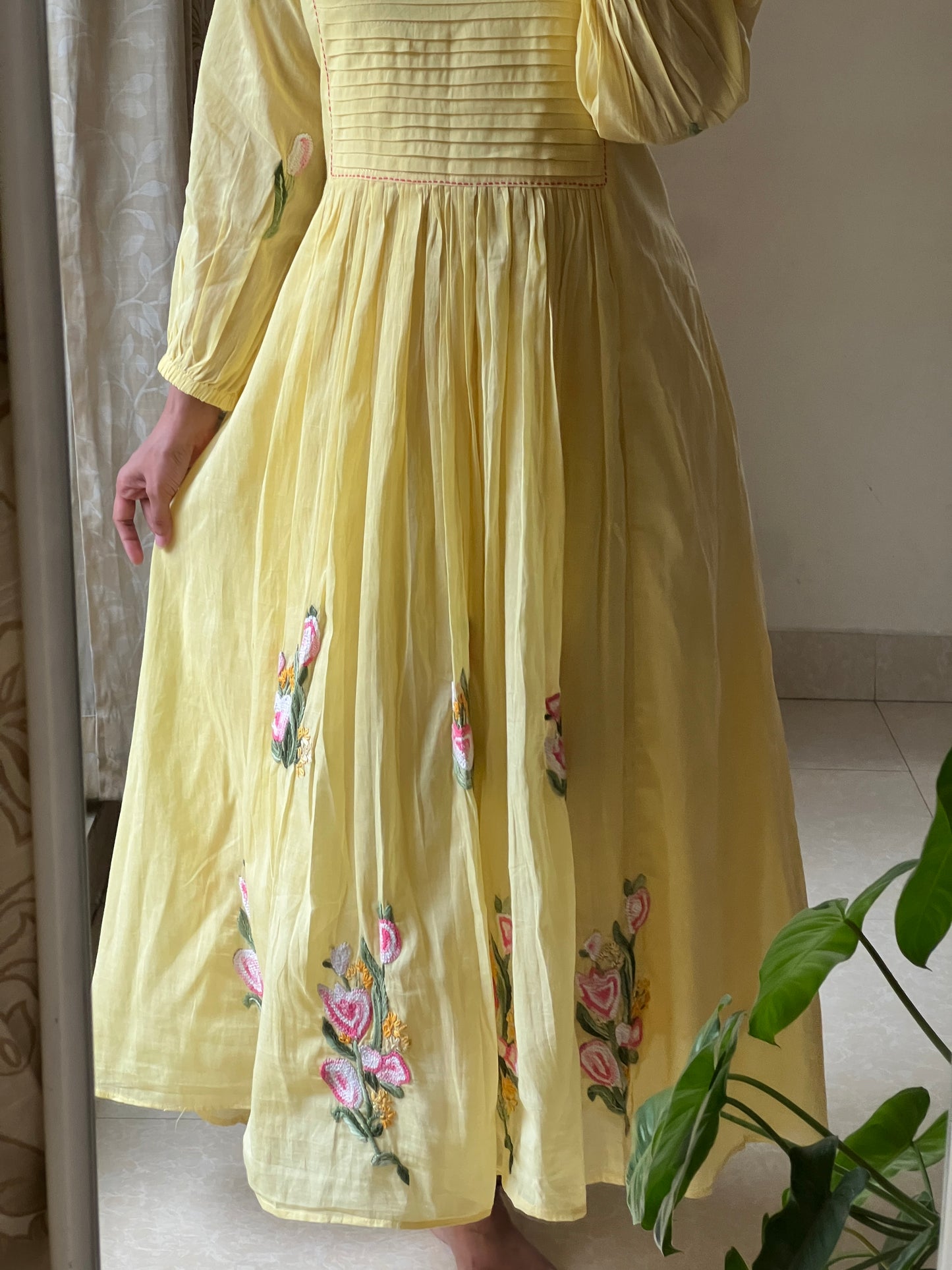 A0488 yellow Mulmul one piece dress with hand embroidery detailing at the bottom & pleats at the yoke part