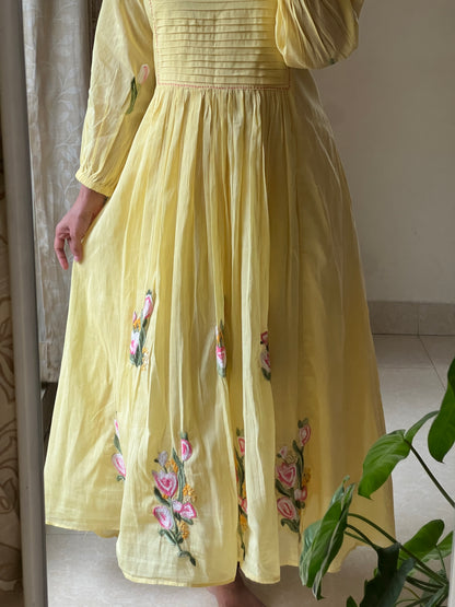 A0488 yellow Mulmul one piece dress with hand embroidery detailing at the bottom & pleats at the yoke part