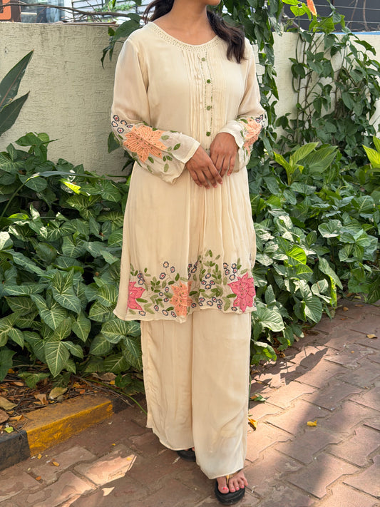 A0696 cream Chinnon coord set with hand embroidery & applique work detailing comes with plazzo pants