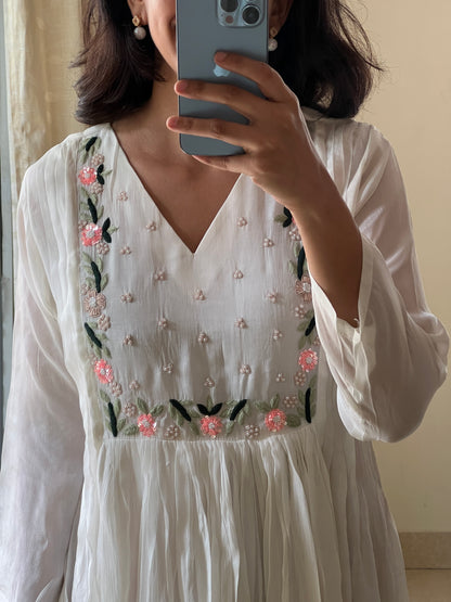 A0450 white chinnon one piece dress with hand embroidery detailing on yoke part
