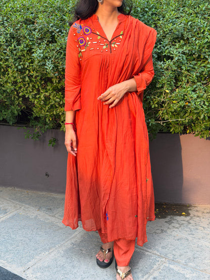 A0659 orange mul chanderi 3 piece dress with hand, mirror embroidery on yoke part, these are one sizes down so go for one size up