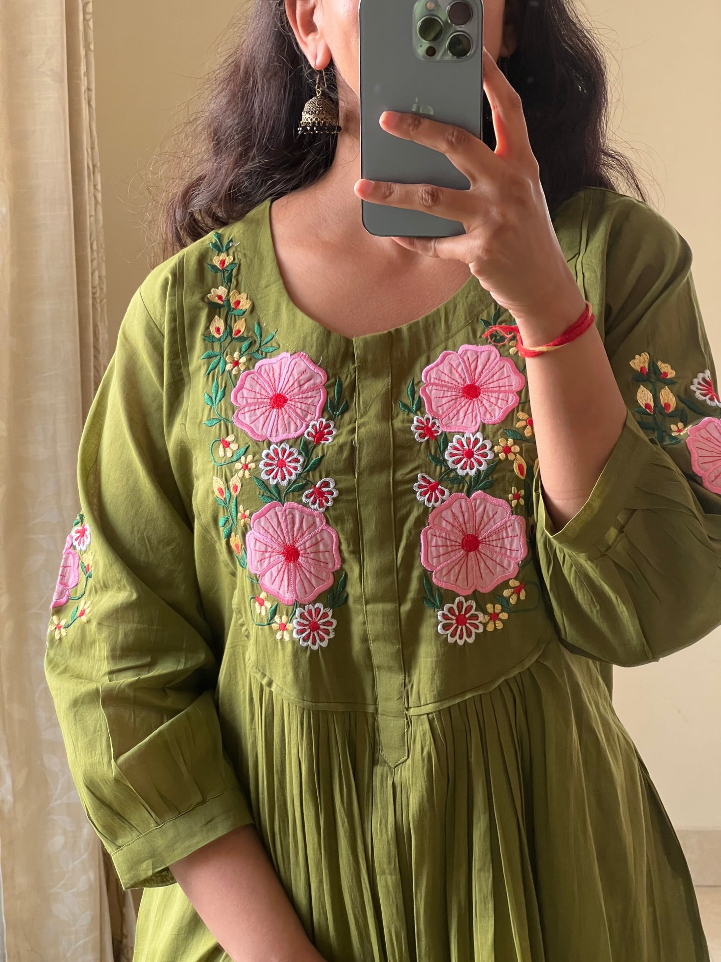 A0644 green Mulmul one piece dress with applique work detailing on yoke part