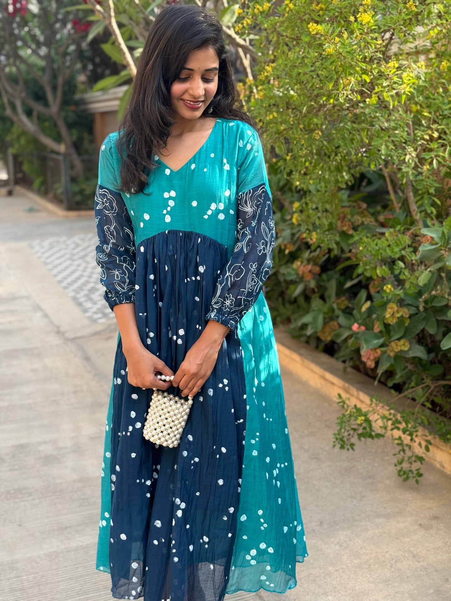 A0444 This stunning block-printed dress is crafted from a luxurious blend of premium MulChanderi fabric. Experience the ultimate in eco-friendly fashion and artistic detail of Block print.