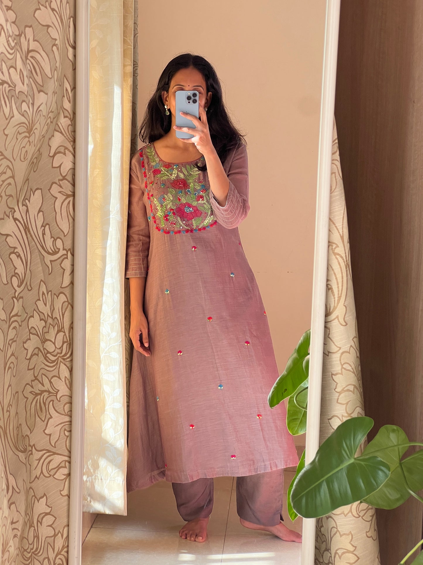 A0546 brown mul chanderi 2 piece dress with Kantha work detailing on yoke part & butties all over the dress