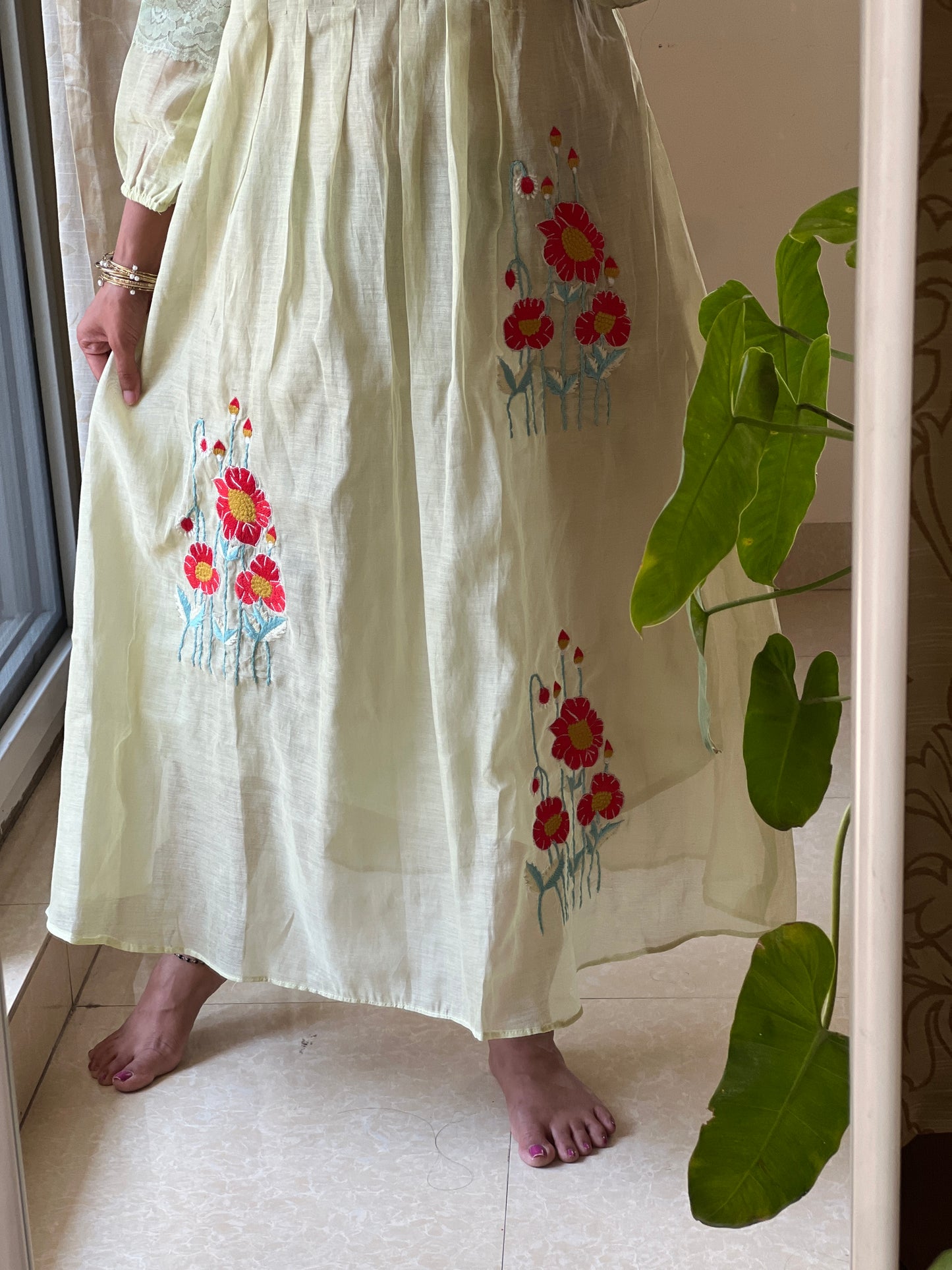 A0382 Mul chanderi frock in pretty pista green shade, provided with embroidery and lace detailing for hands