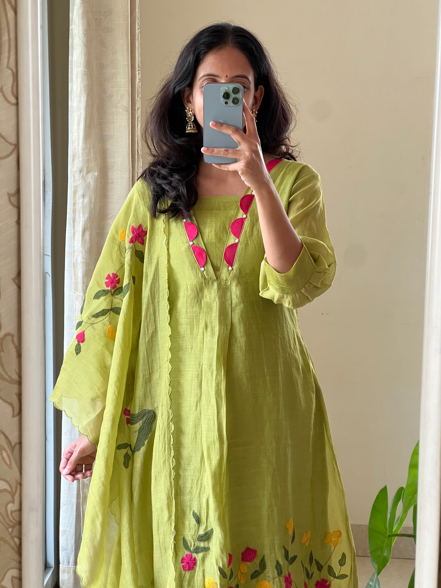 A0522 green Mulchanderi 3 piece dress with multi colour applique work detailing at the bottom of the dress