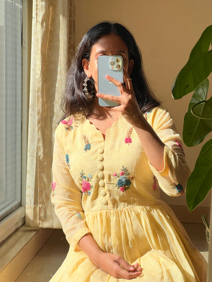 A0463 yellow Kota one piece dress with hand embroidery detailing all over the dress