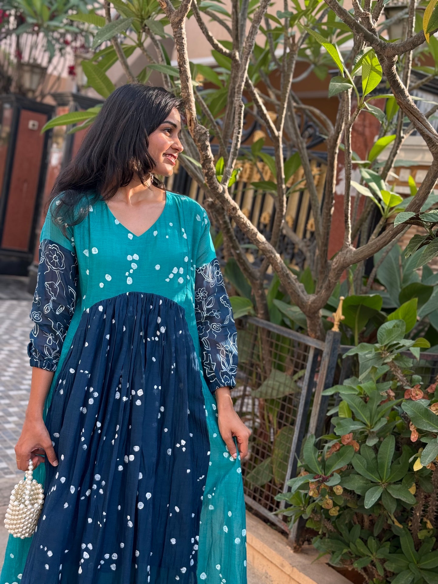 A0444 This stunning block-printed dress is crafted from a luxurious blend of premium MulChanderi fabric. Experience the ultimate in eco-friendly fashion and artistic detail of Block print.