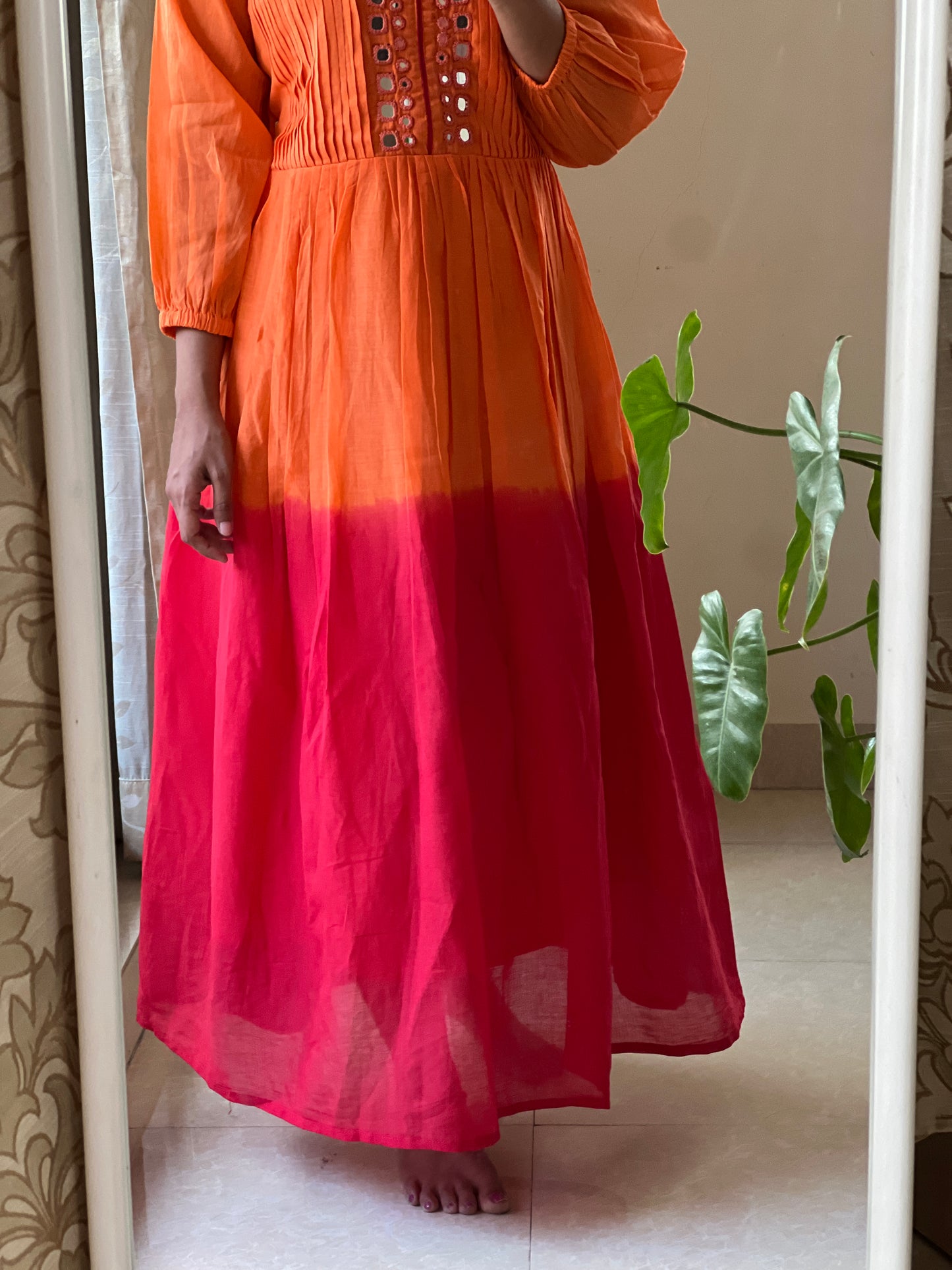 A0350 orange & red mulmul shaded one piece dress with mirror work embroidery & pleats detailing