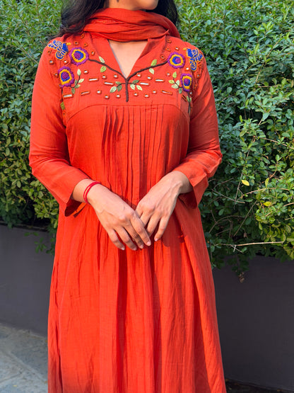 A0659 orange mul chanderi 3 piece dress with hand, mirror embroidery on yoke part, these are one sizes down so go for one size up