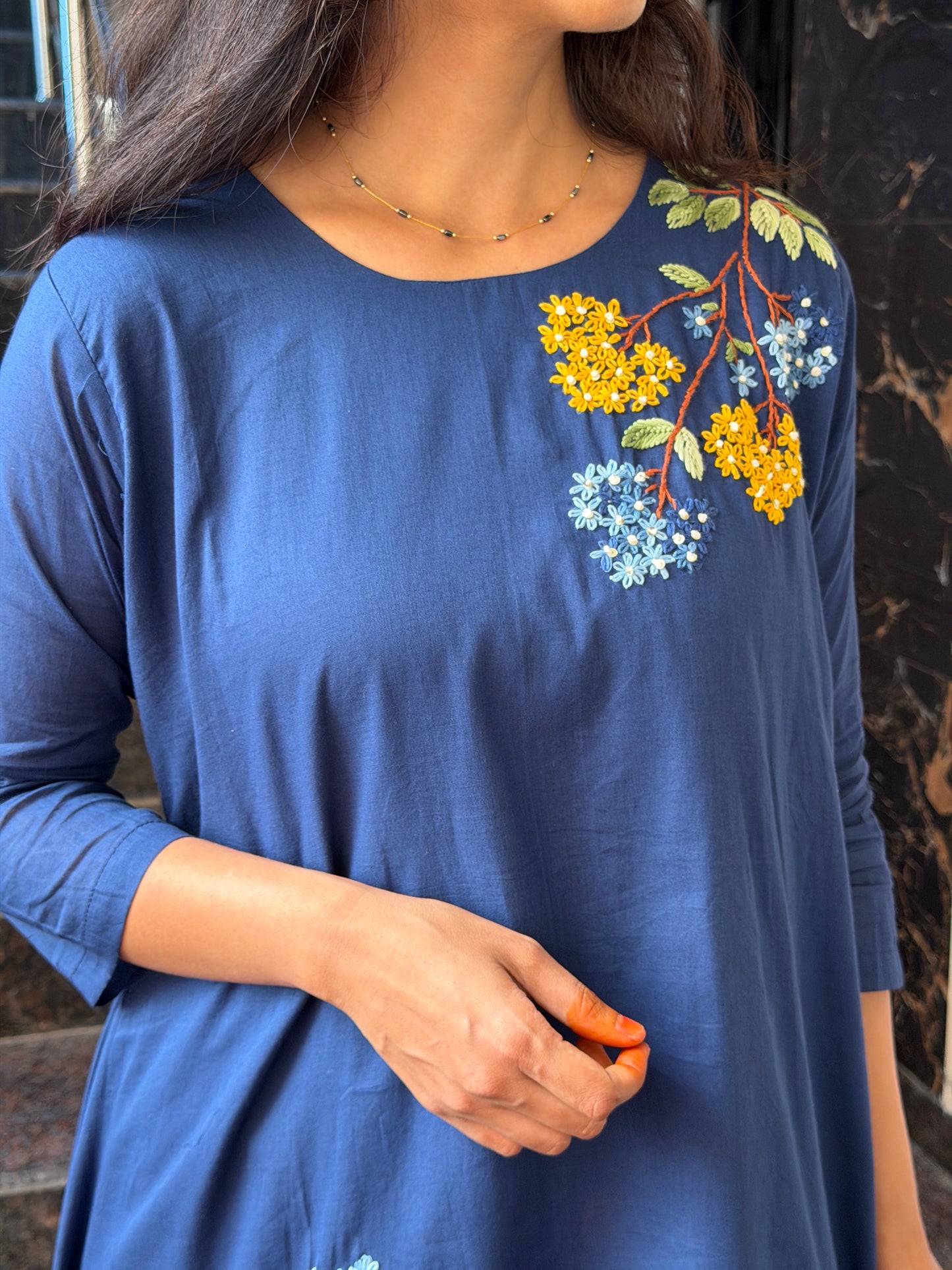 A0812 Mul cotton cord set with hand embroidery detailing.
