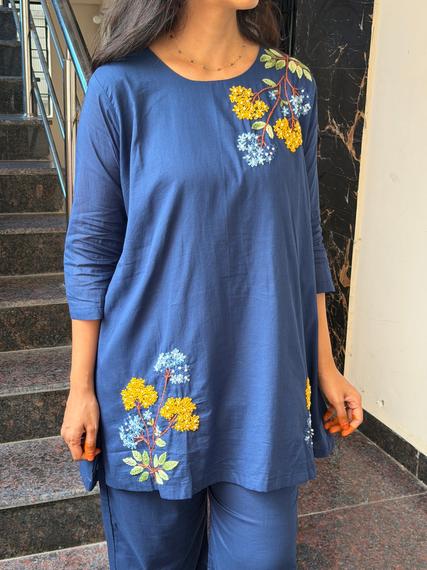 A0812 Mul cotton cord set with hand embroidery detailing.