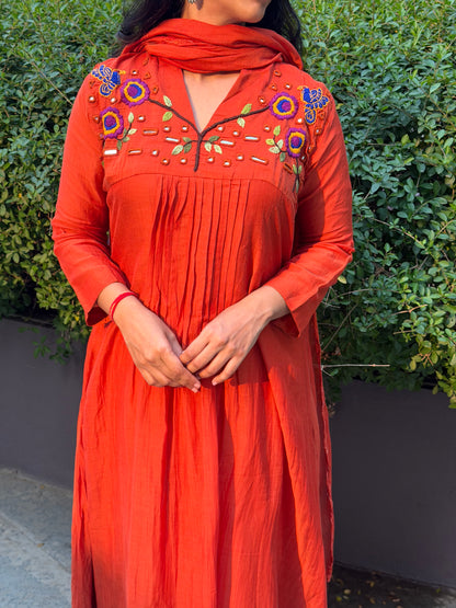 A0659 orange mul chanderi 3 piece dress with hand, mirror embroidery on yoke part, these are one sizes down so go for one size up