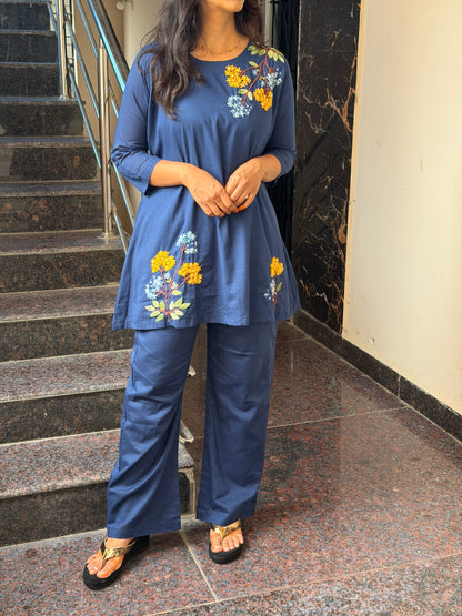 A0812 Mul cotton cord set with hand embroidery detailing.