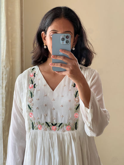 A0450 white chinnon one piece dress with hand embroidery detailing on yoke part